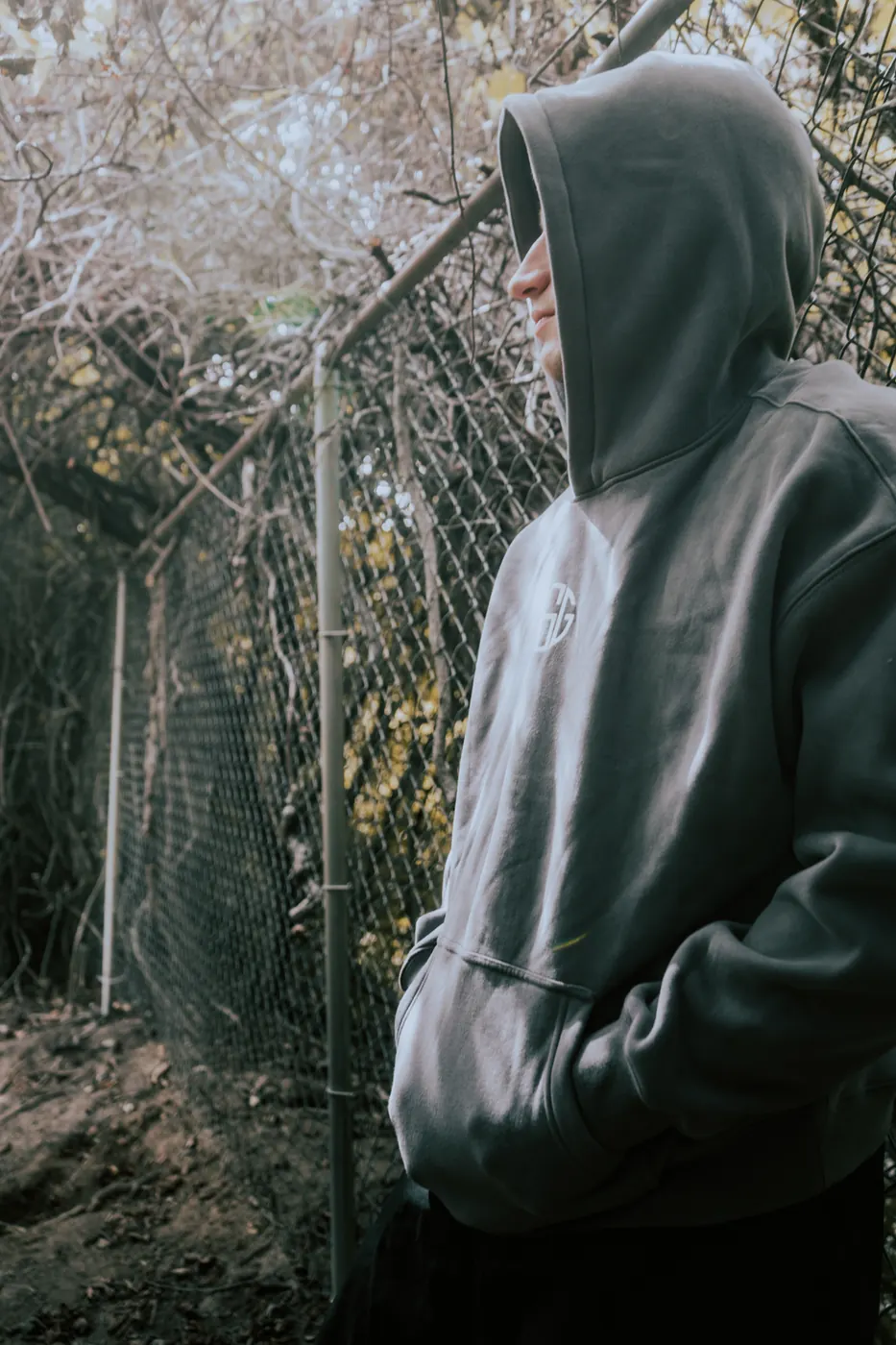 The Reaper hoodie in grey, oversized fit from the side